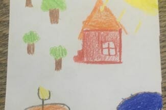 Teckning av ett rött hus