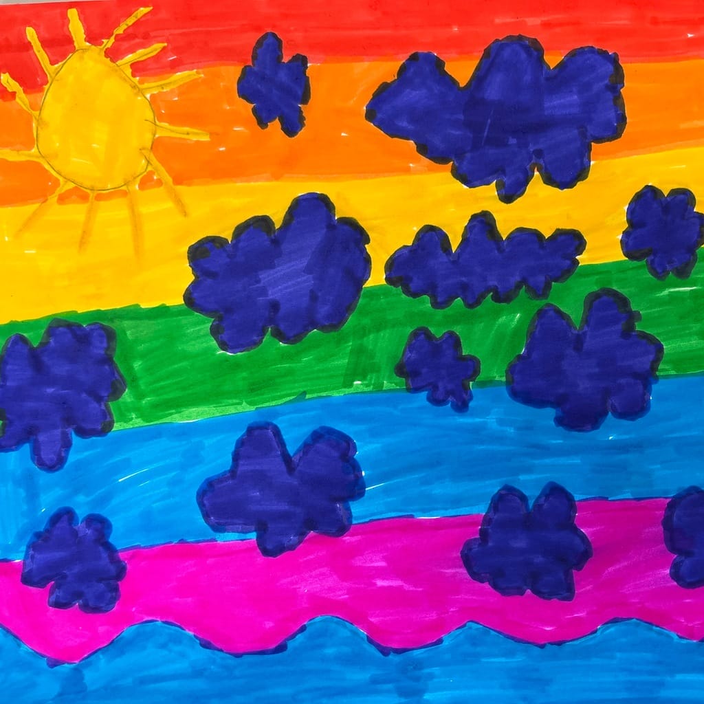 Teckning av en regnbågsfärgad himmel med blåa måln