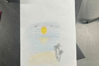 Teckning av en sol och en strand