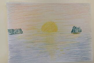 En bild av en solnedgång med träd